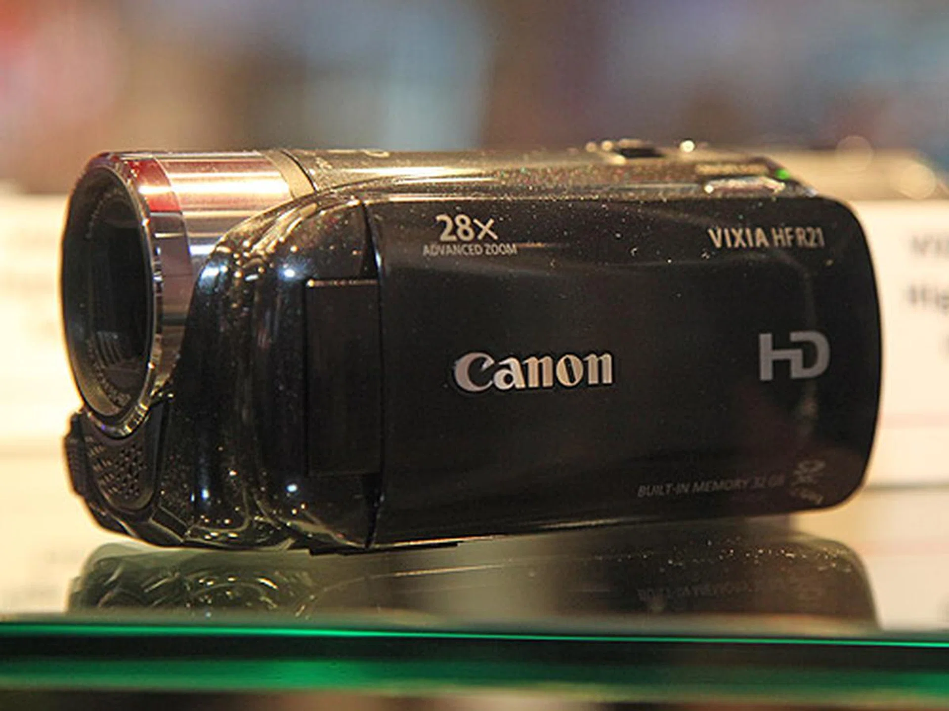 The new Canon VIXIA HF R21 Flash Memory Camcorder has a 32GB internal flash drive, together with two SDXC-compatible memory card slots, Canon's Relay Recording, a 3.0-inch Touch Panel LCD and Smart Auto. It comes with Genuine Canon HD Video Lens with 28x Advanced Zoom and Dynamic IS.