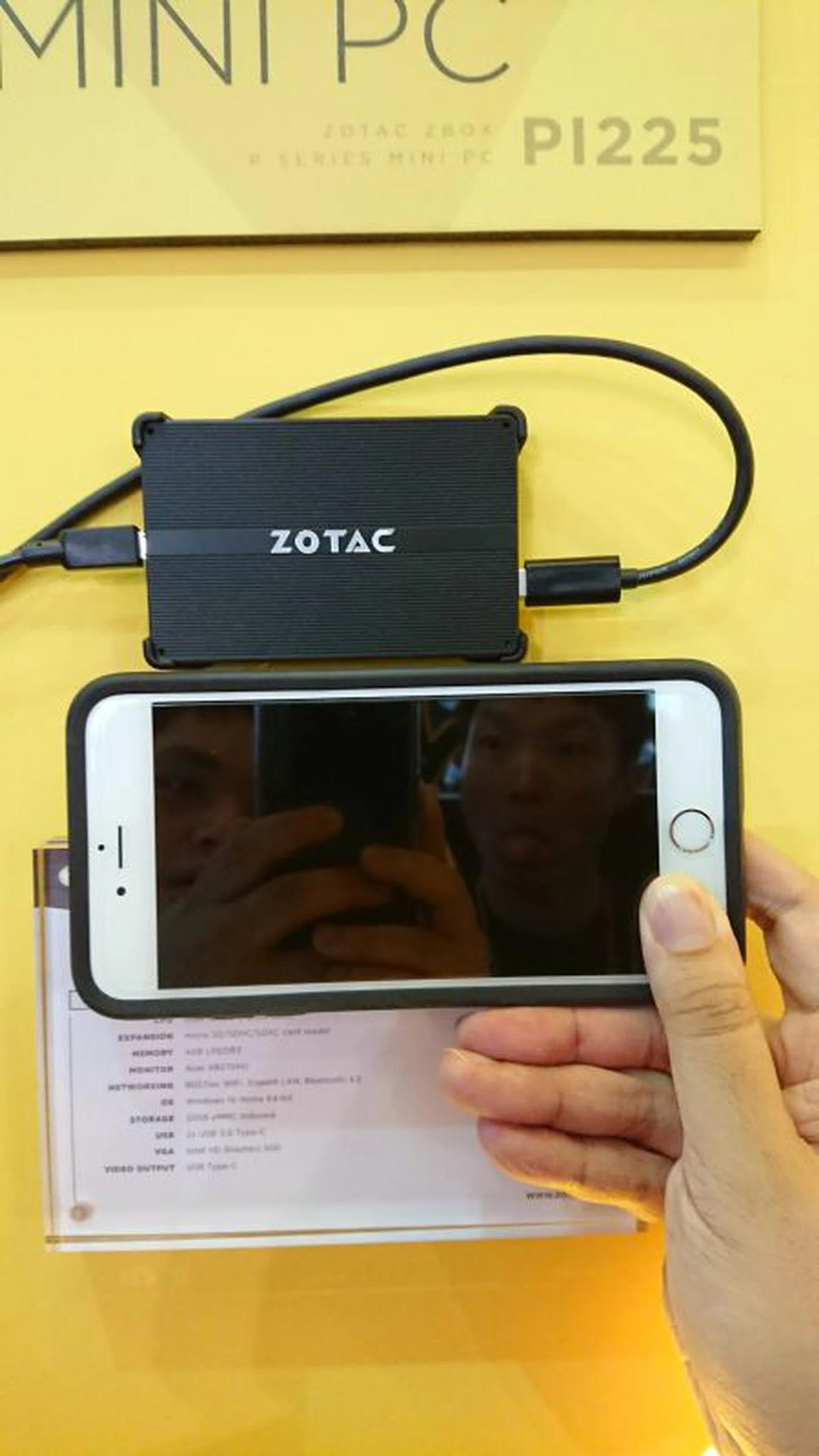 Here is a size comparison between the ZBox and an Apple iPhone.