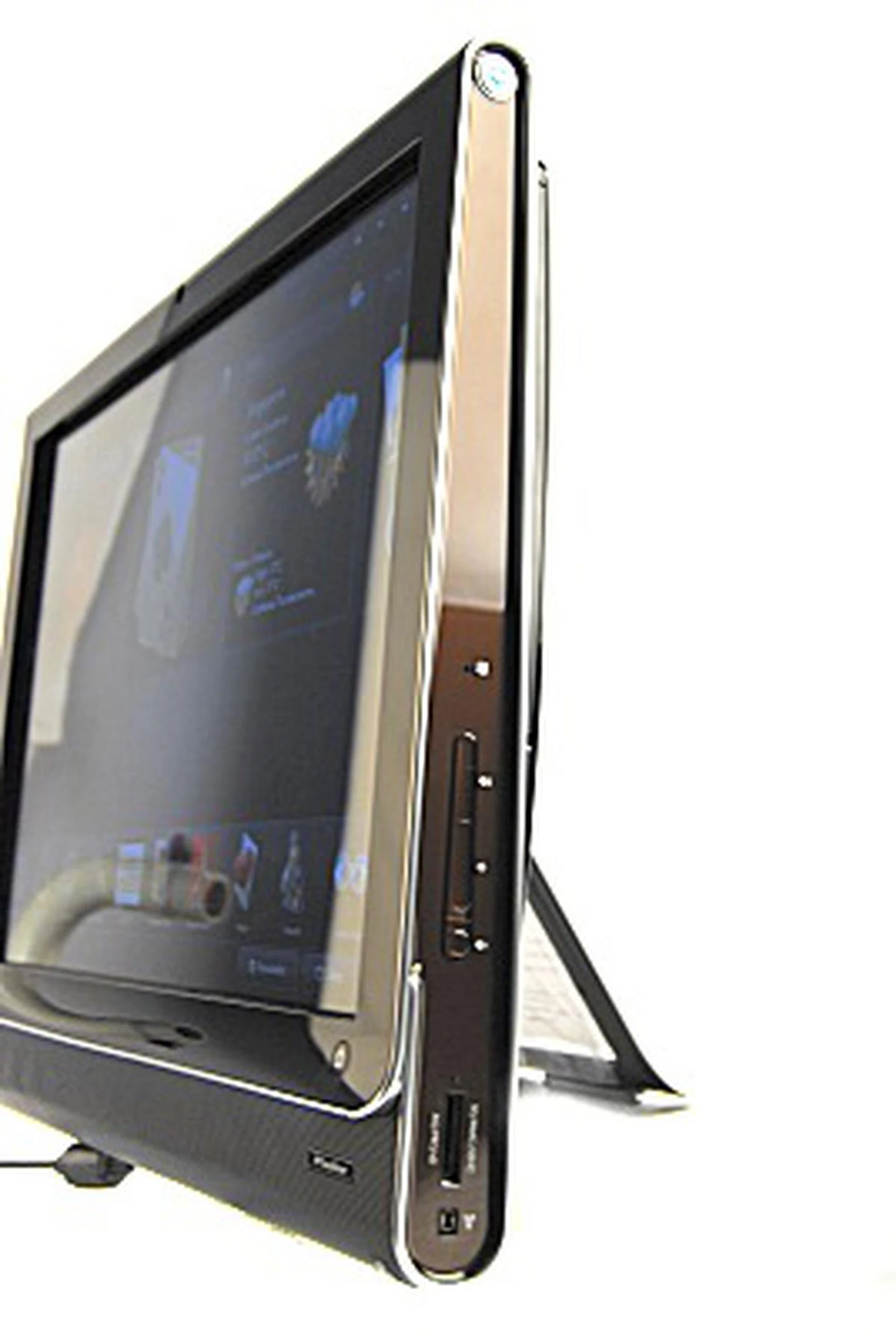 The right side of the IQ506 sports a 5-in-1 card reader, the volume controls and a IEEE 1394 port.