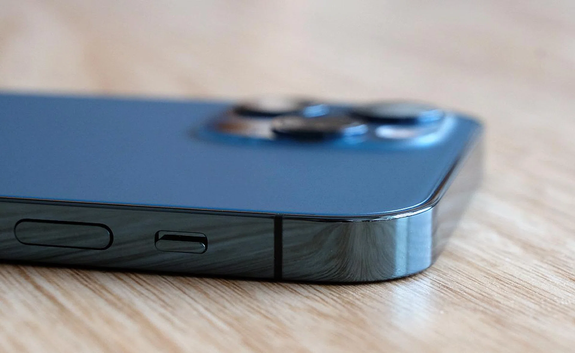 The sides of the iPhone 12 Pro are highly reflective.