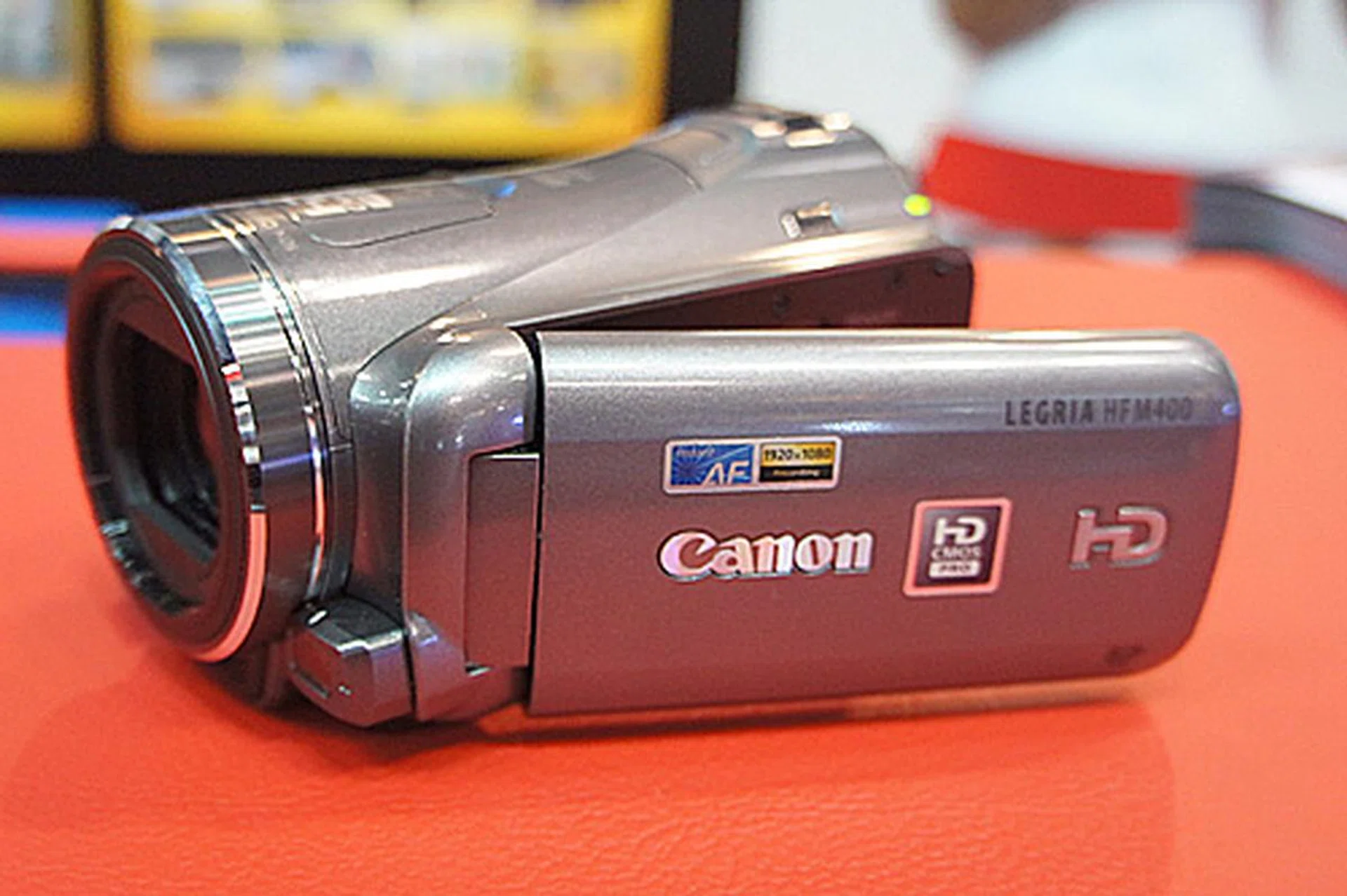 The LEGRIA HF M400 is also a Full HD 1920 x 1080, flash memory camcorder that use Canon's large HD CMOS Pro sensor. It sports two SD slots, Relay Recording function, high quality microphone, and Canon's new Cinema Style functions (Story Creator, Cinema-Look Filter, and Touch Decoration). It's going at $1,149. Freebies include an extra battery, a 16GB SD card, 500GB HDD, tripod and video bag.