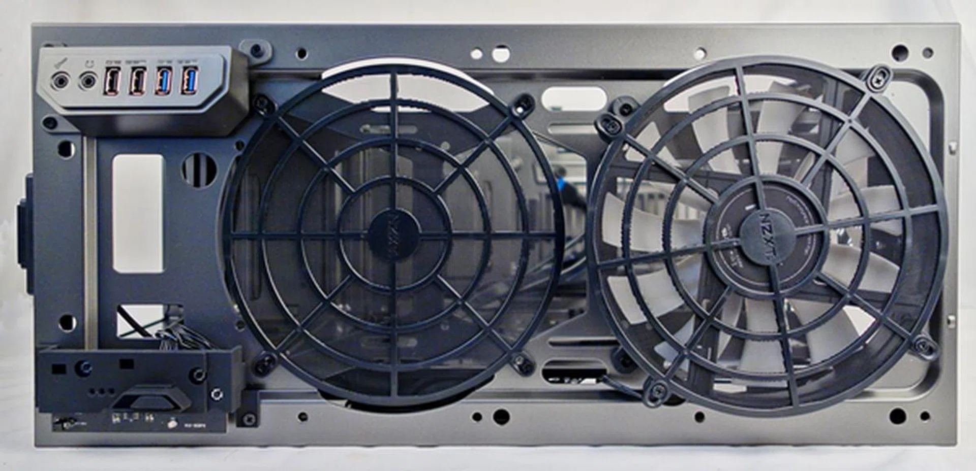 With its top plastic panel removed, we can see the 200mm exhaust cooling fan. There are two removable filters, each with a fine plastic mesh.