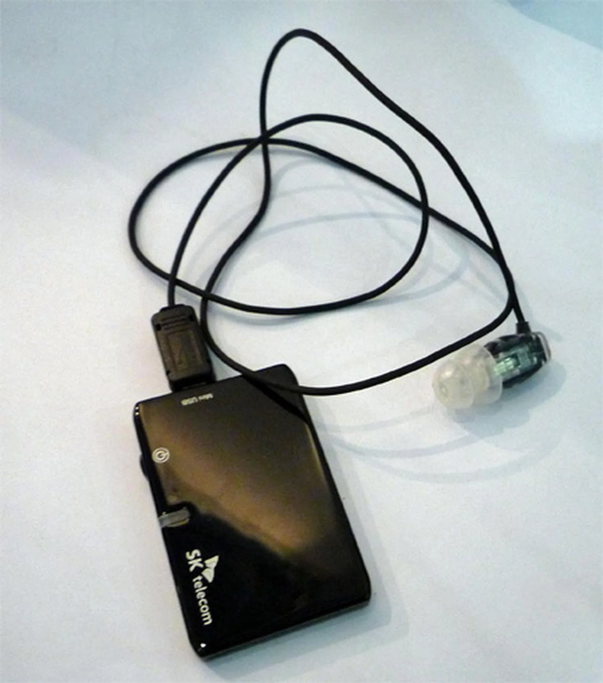  This is the Bluetooth PTT Explorer. It is a Bluetooth headset with internal microphone type earphone which makes conversation in noisy circumstances easier.  