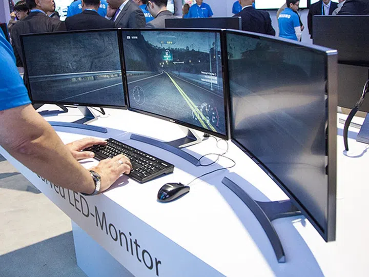 If you're a gamer, you'll need at least 3 to give you that immersive experience. Not that you can't achieve this with flat screen monitors, but you'll get a more seamless curve with this.