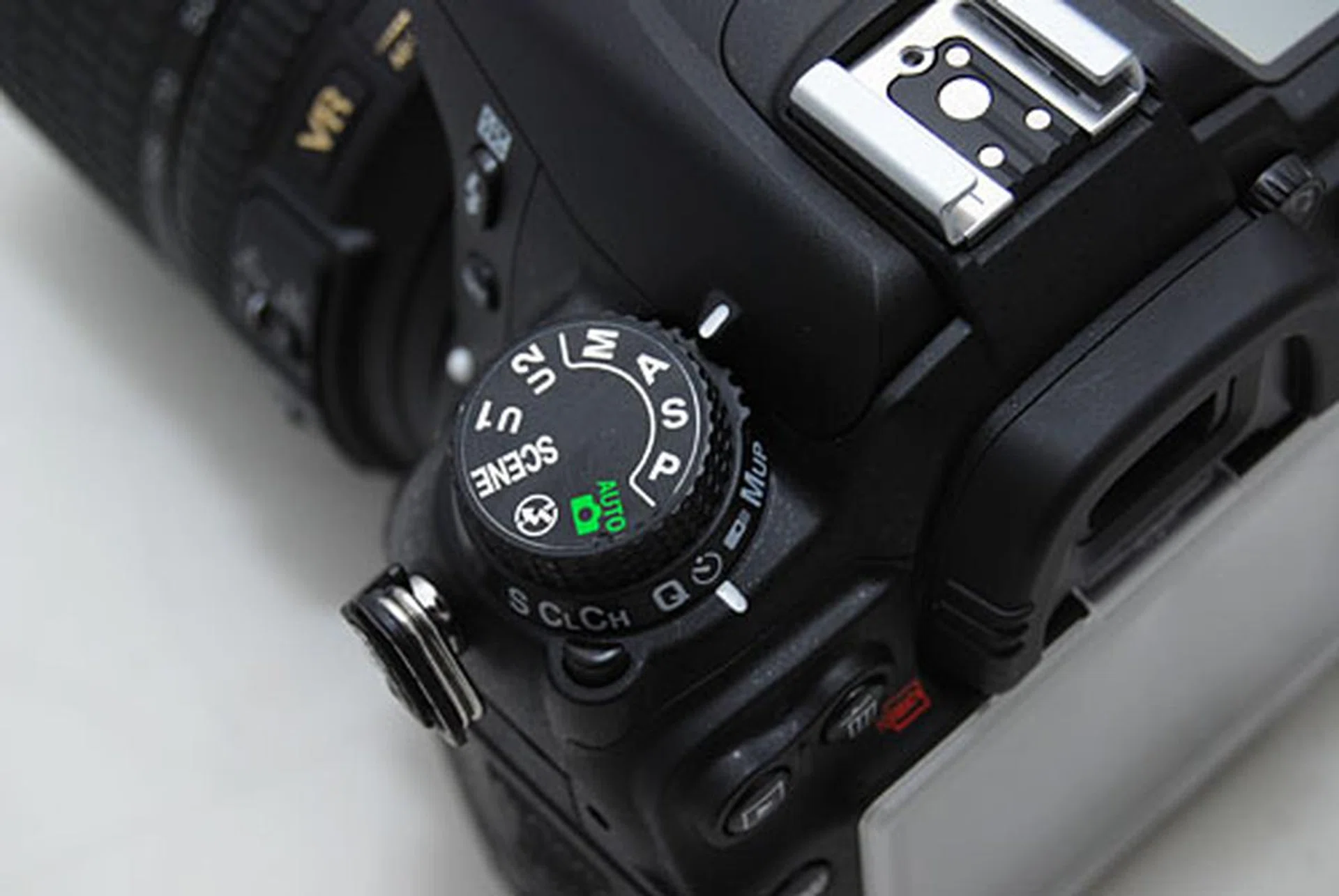 The other significant change from a D90 is the addition of a shooting mode dial below the mode dial.