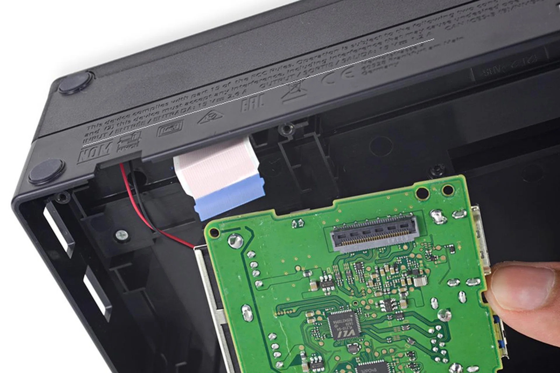In docked mode, the dock's USB-C port will supply a maximum of 15V at 1.2A to the console. (Image source: iFixit.)