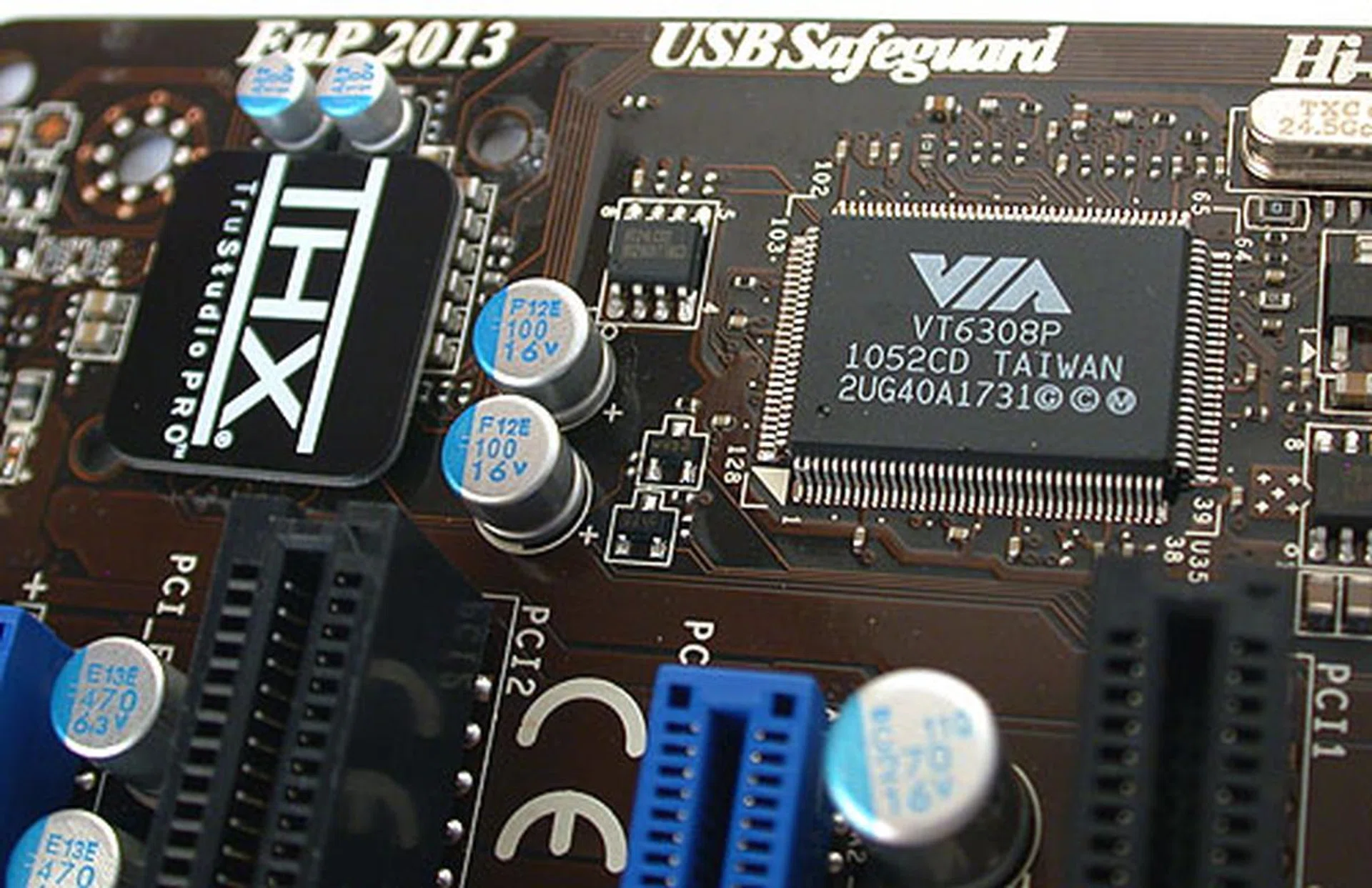 A VIA controller provides FireWire functionality for that small group of users who will need it. Personally, we're all for more USB 3.0 ports instead. As for the THX logo, it's stuck over the standard Realtek ALC892 HD audio CODEC that's actually doing the work. 