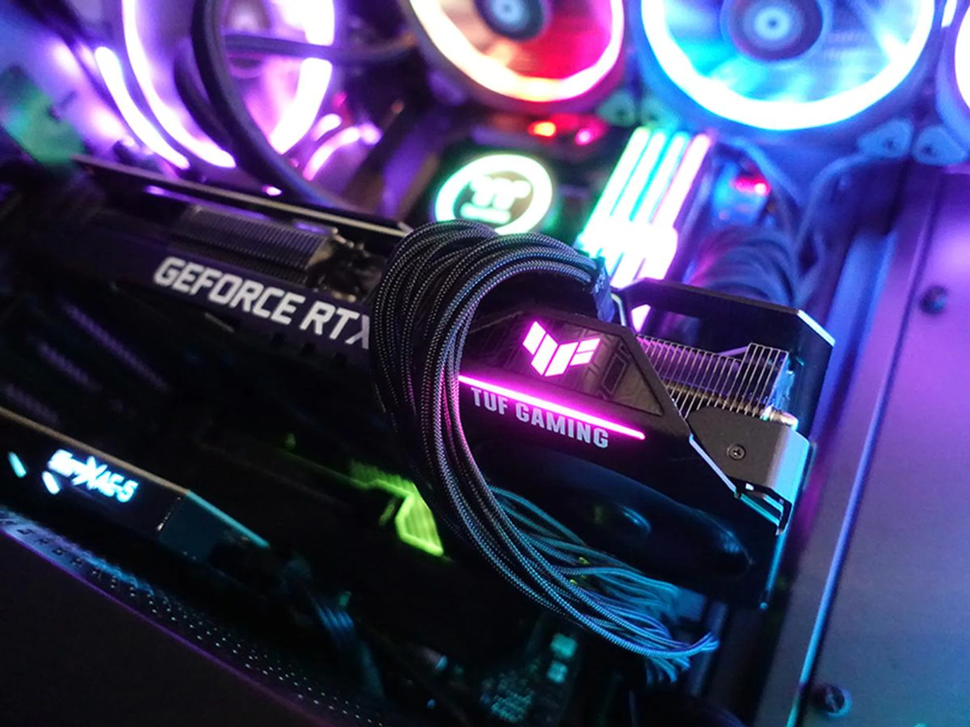 This is the only lighting element you'll get on the card, which can be customized in ASUS fashion with a range of aesthetic and functional effects and also synced with other ASUS components to enable uniform lighting. Subtle and small, you will likely not have any headaches.