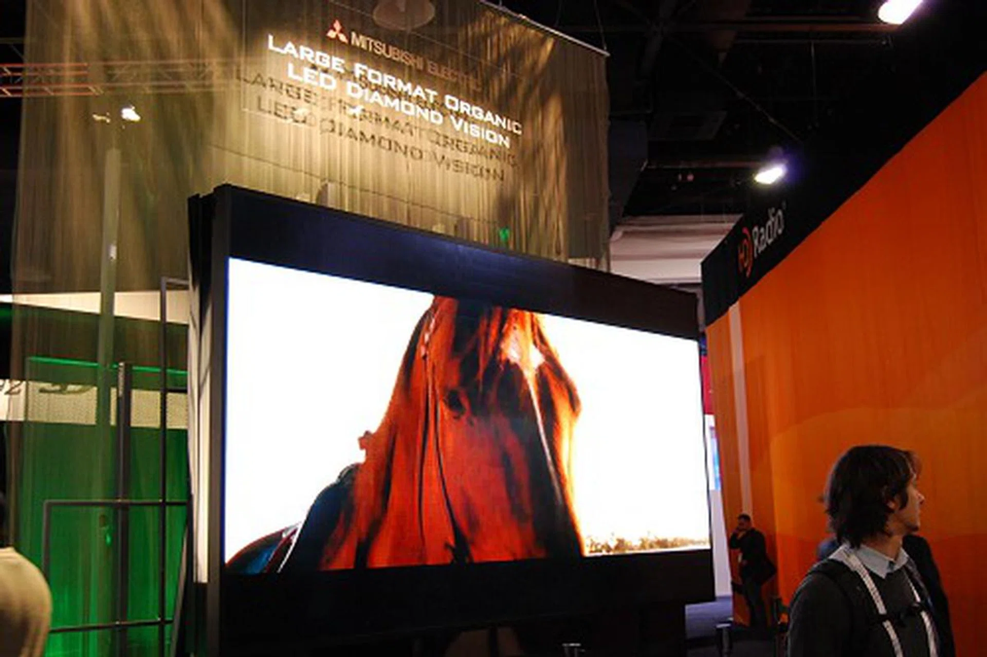 Outside of their booth, this is a massive large format organic LED TV demoed by Mitsubishi.