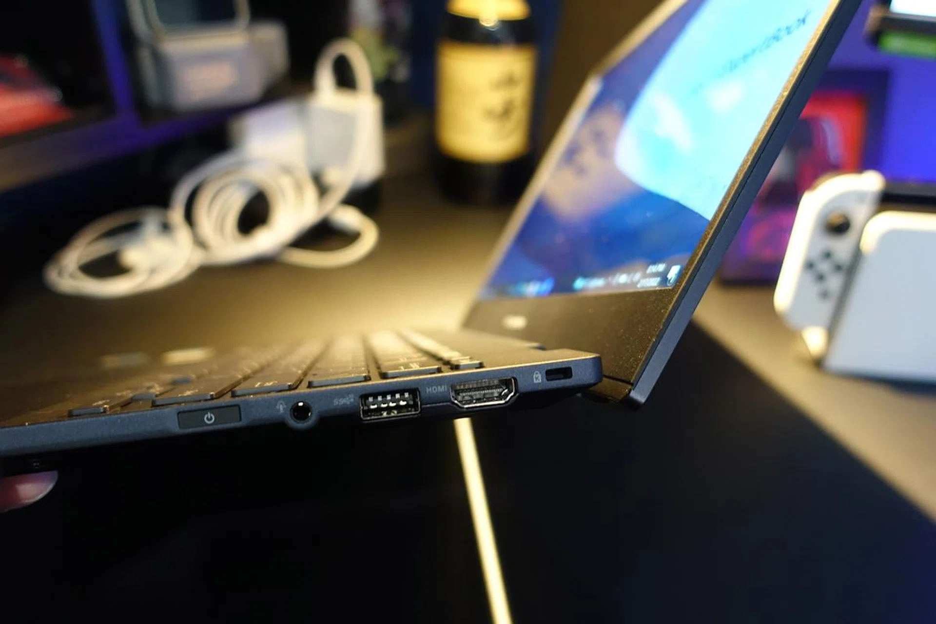 The side power button has a fingerprint sensor embedded within it for secure biometrics-based login. Also notable from this picture is how the display's hinge opens up to lift the notebook's base for a better typing experience.