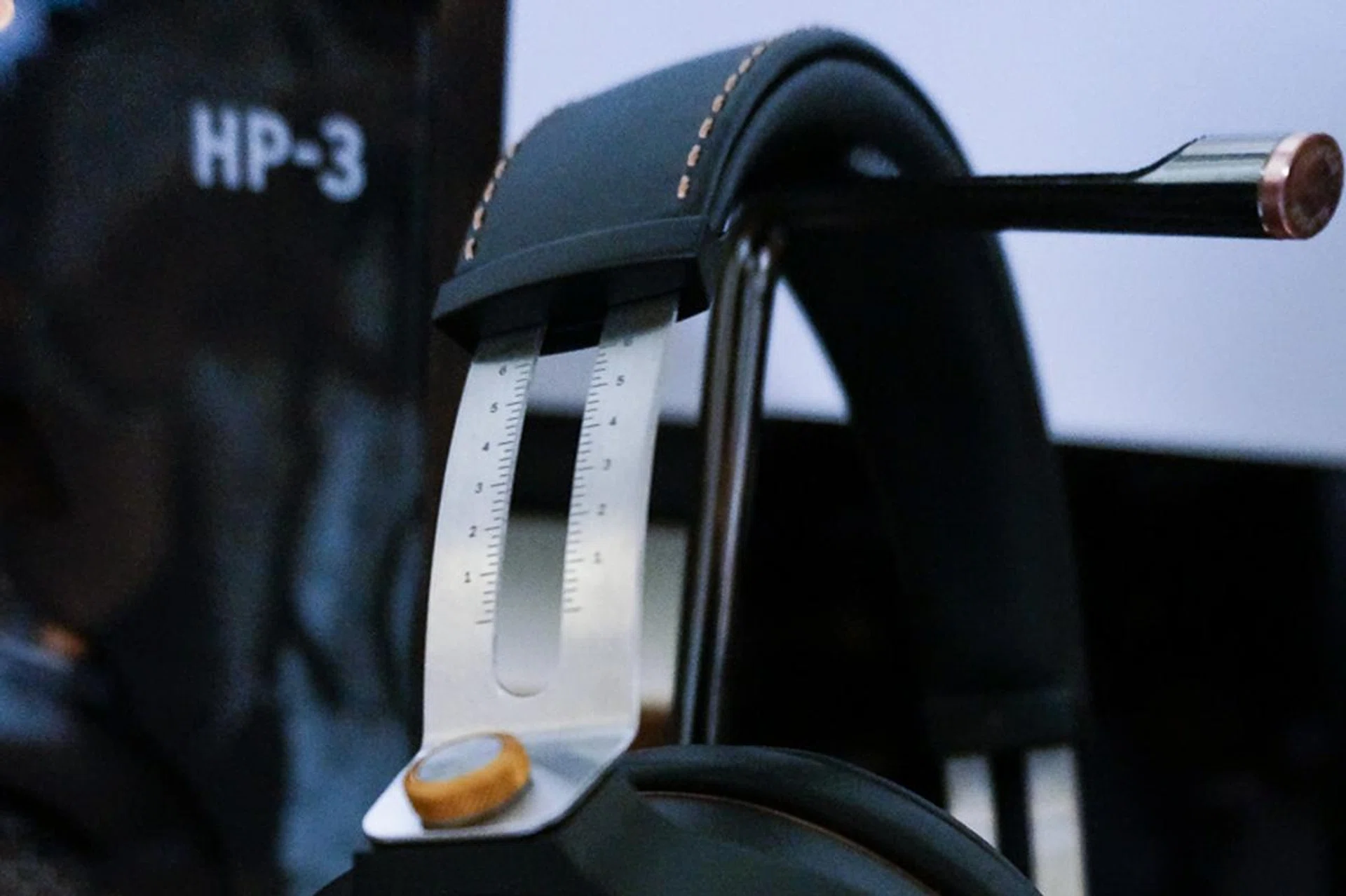 Hand-stitched leather covers the headband. 