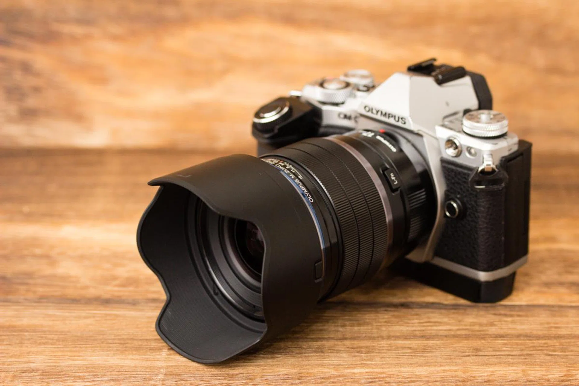 The 17mm f/1.2 Pro with its lens hood attached.