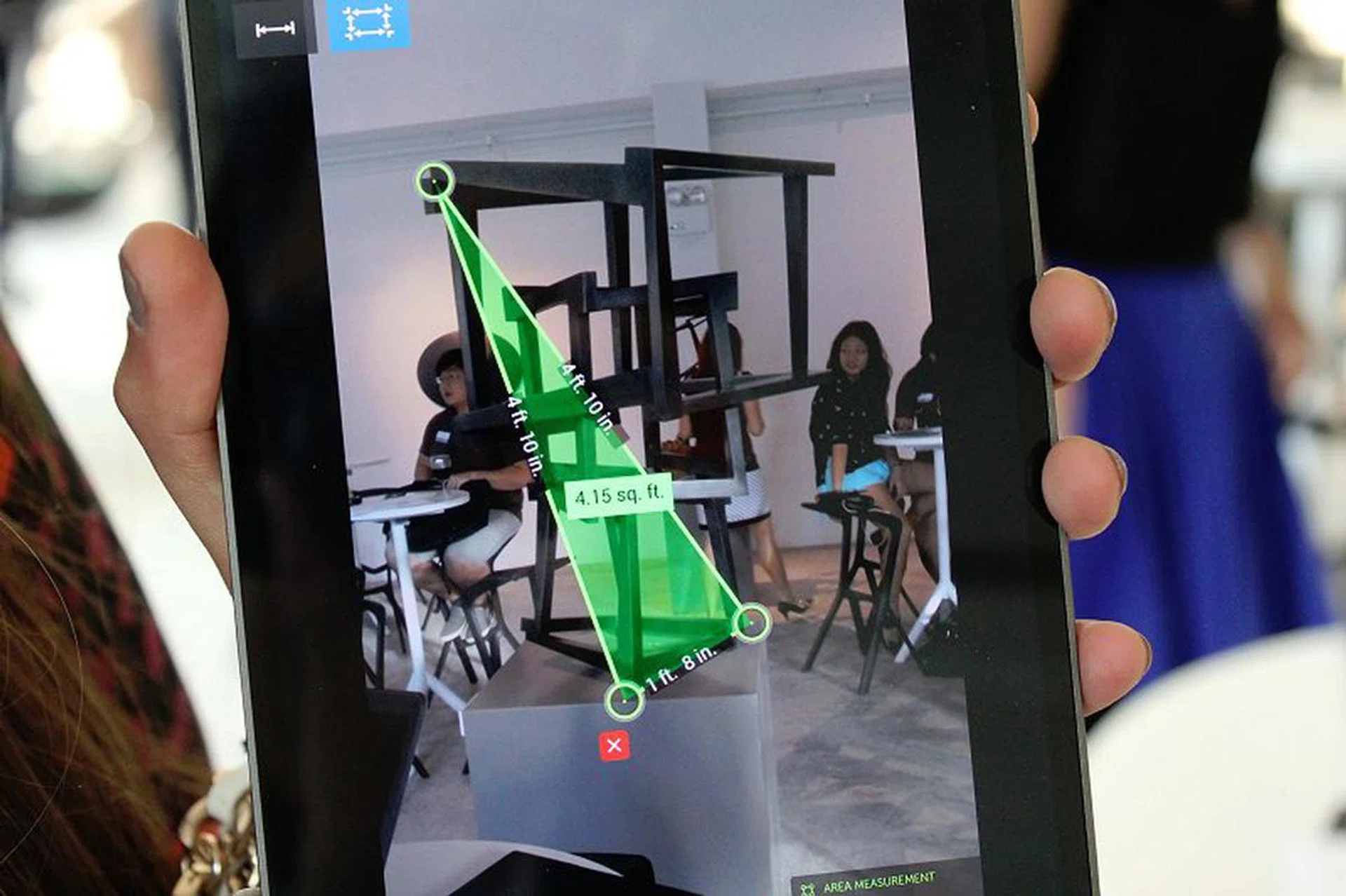 If you have multiple points selected on the image, you can toggle between measuring the individual distance or the area inside the points.