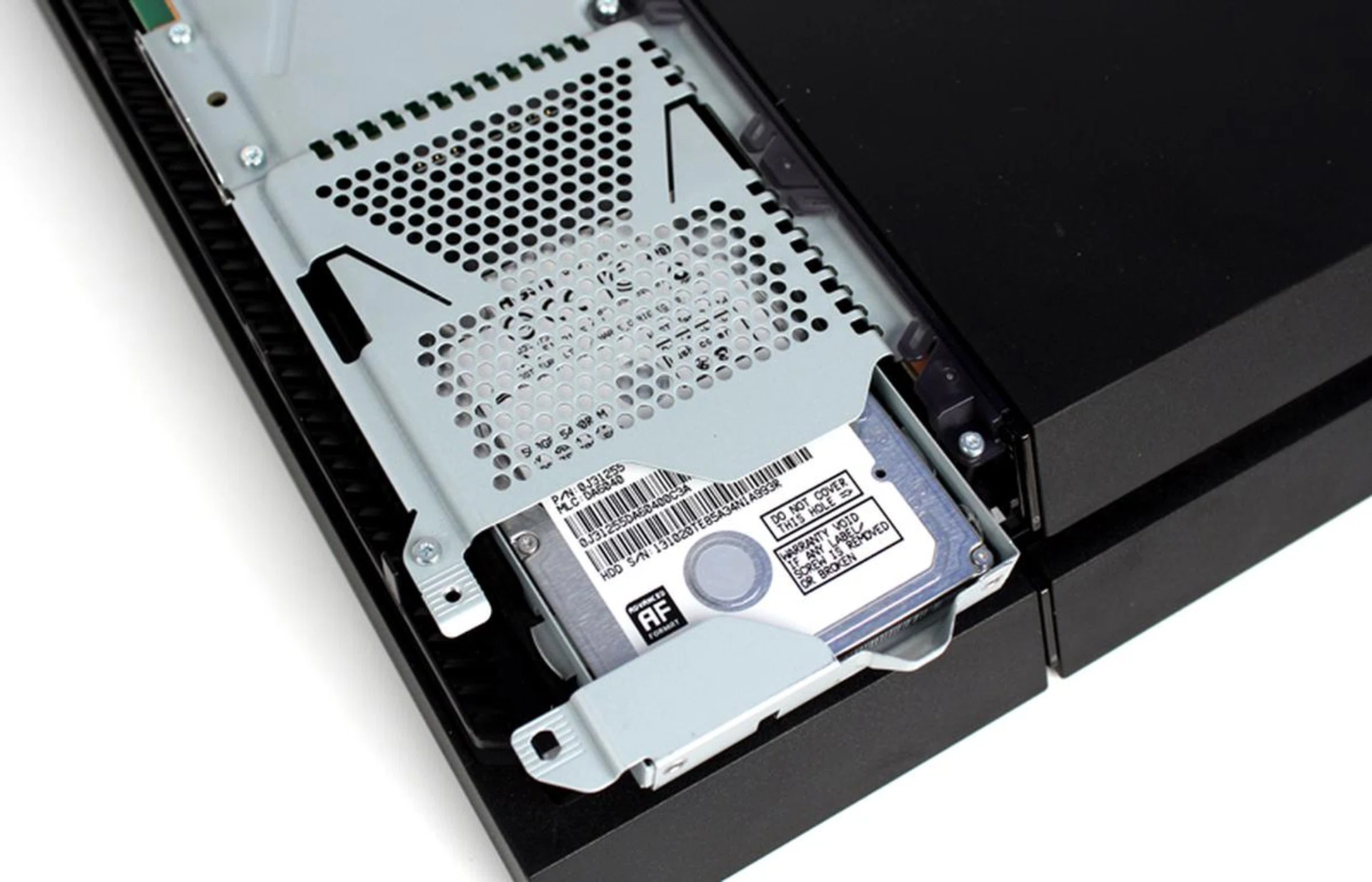 Remove the screw and you should be able to slide the HDD chassis out.