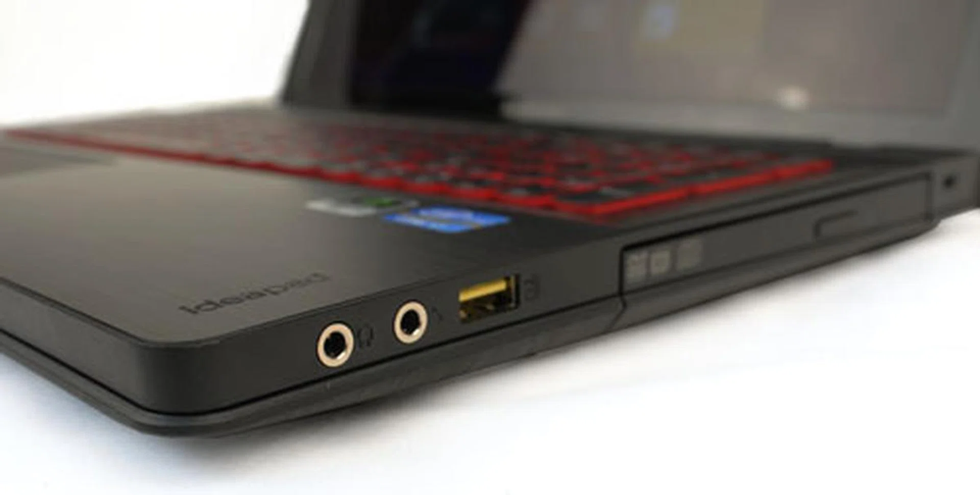 On the right of the machine you'll find one powered USB 2.0 port, plus the microphone and headphone ports.This USB port is probably intended for your mouse.