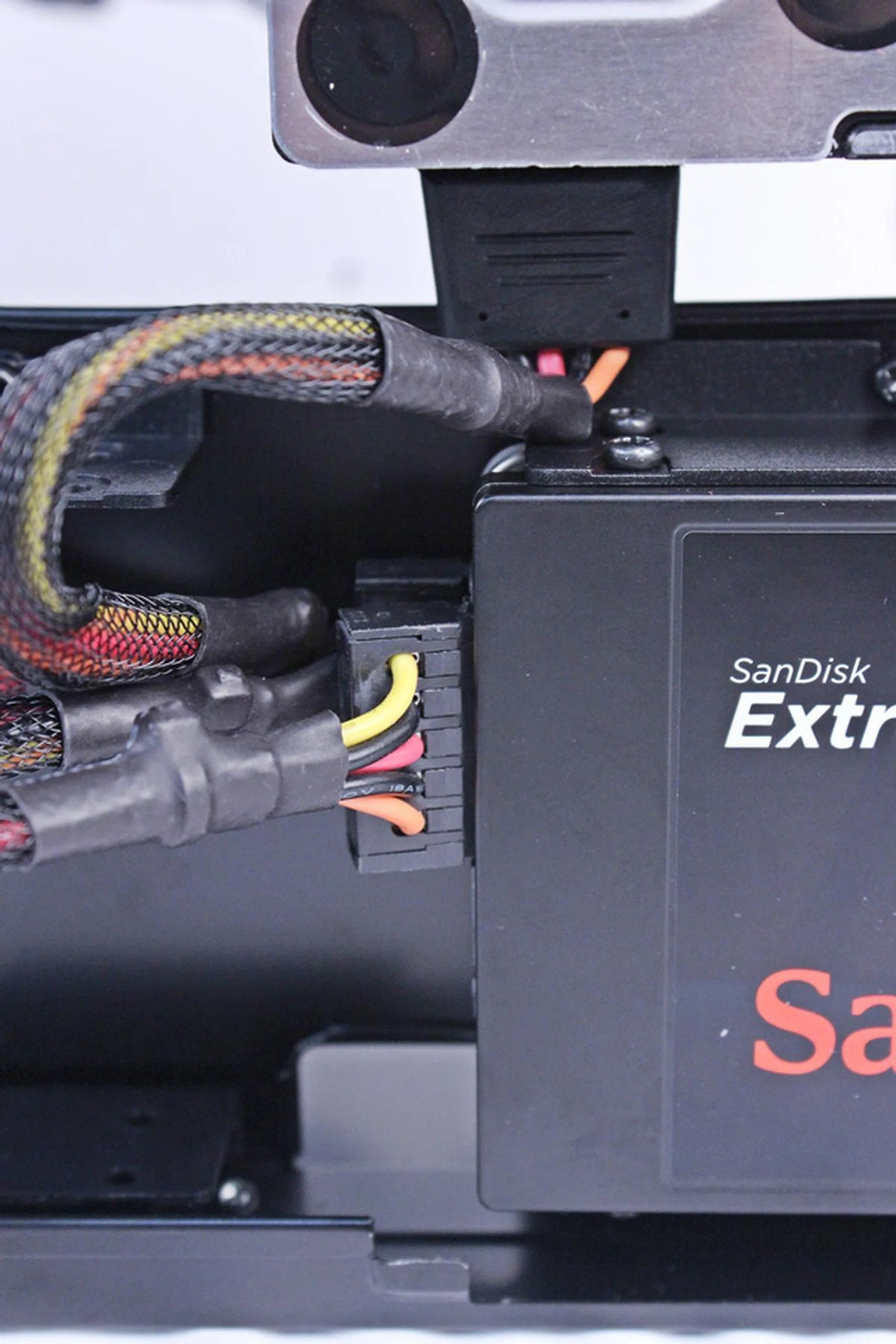 The cables of the SATA power connectors had to be bent in order for the power connectors to be attached to the respective drives.