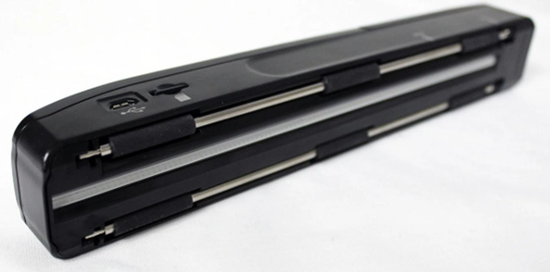 The rollers on the bottom allow you to glide/scan the MiWand 2 Pro over the page. 