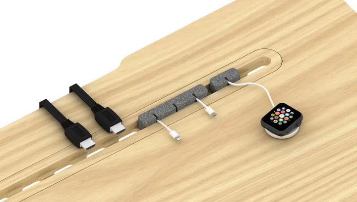 The UniGroove makes it easy for users to thread power cables to their devices. (Image source: EverDesk+)