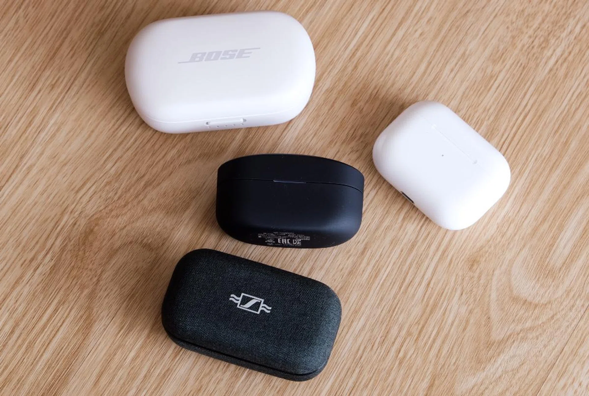 A comparison of charging cases. Only the AirPods Pro's charging case is smaller.