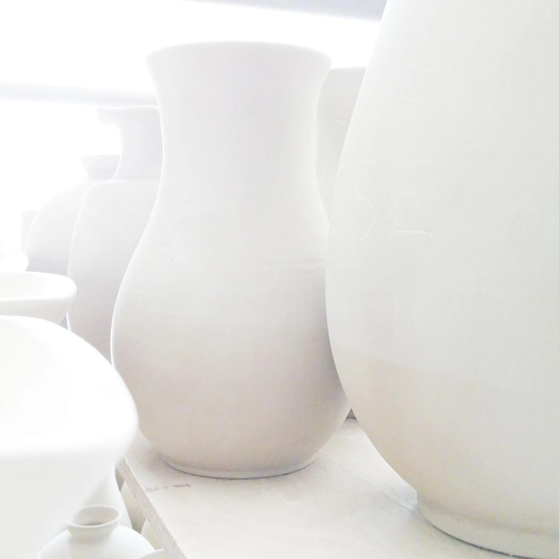 Backlit ceramics, 28mm at f/1.8, 1/25 sec, ISO 350.