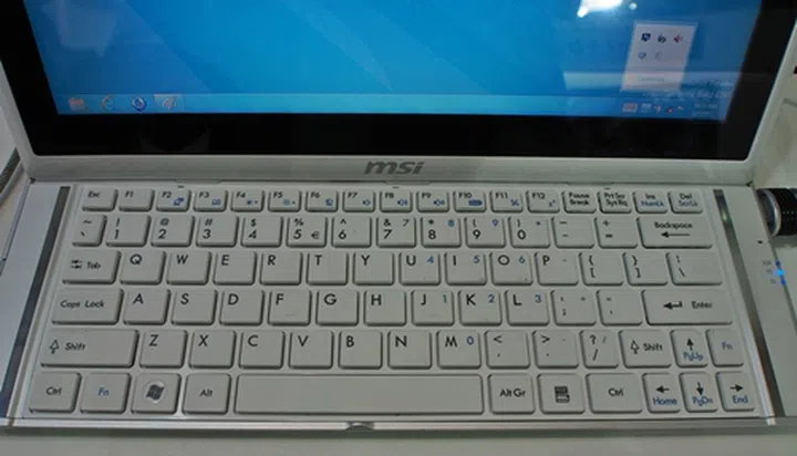 Understandably, there is little real estate for the keys of the keyboard as they need to be hidden by the screen when the Slider S20 slips into tablet mode. Do pack a wrist guard for extensive use at the keyboard.