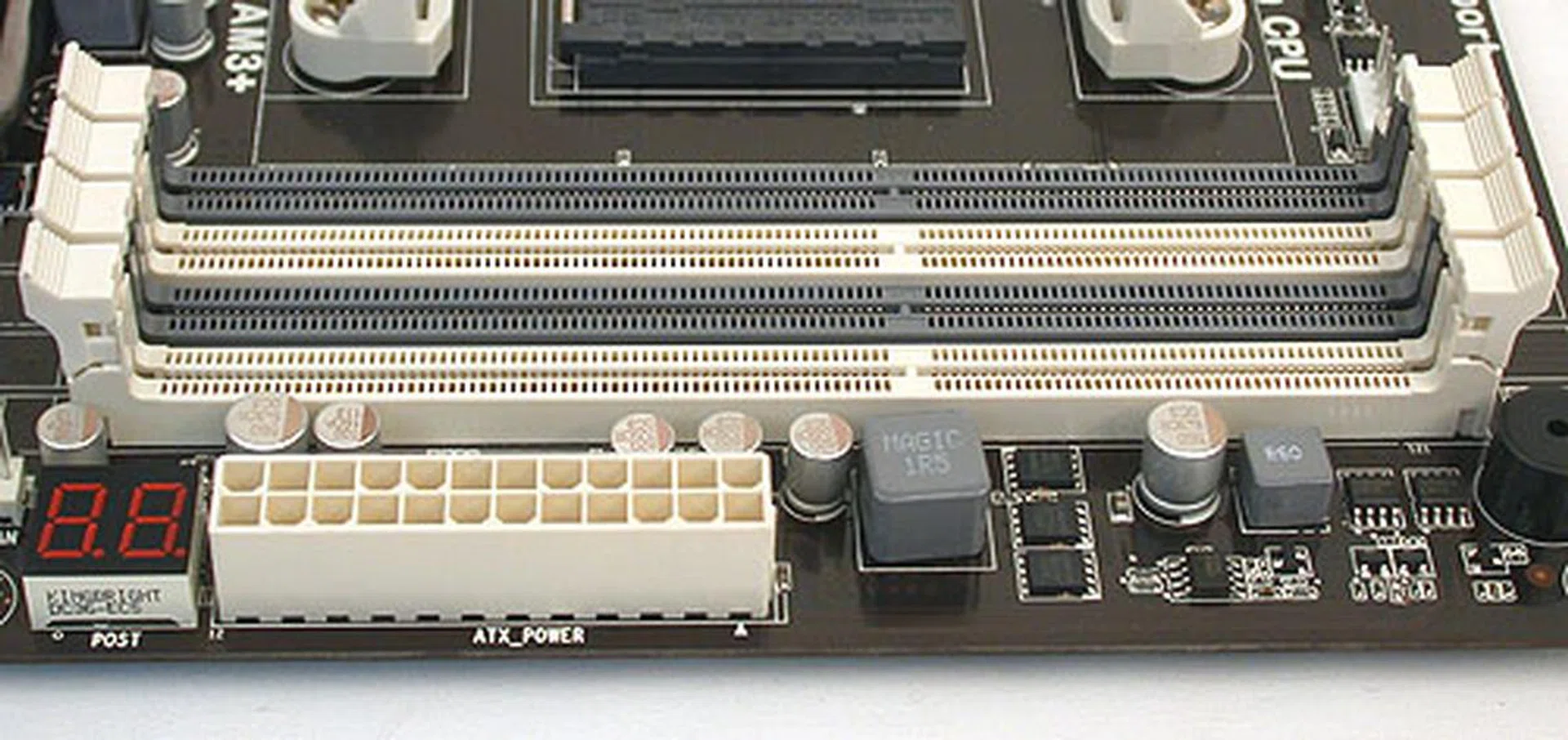 There were no surprises here at the DDR3 DIMM slots, with the standard 4 DIMM, dual-channel configuration. ECS also added a debug LED for POST messages at the bottom here.