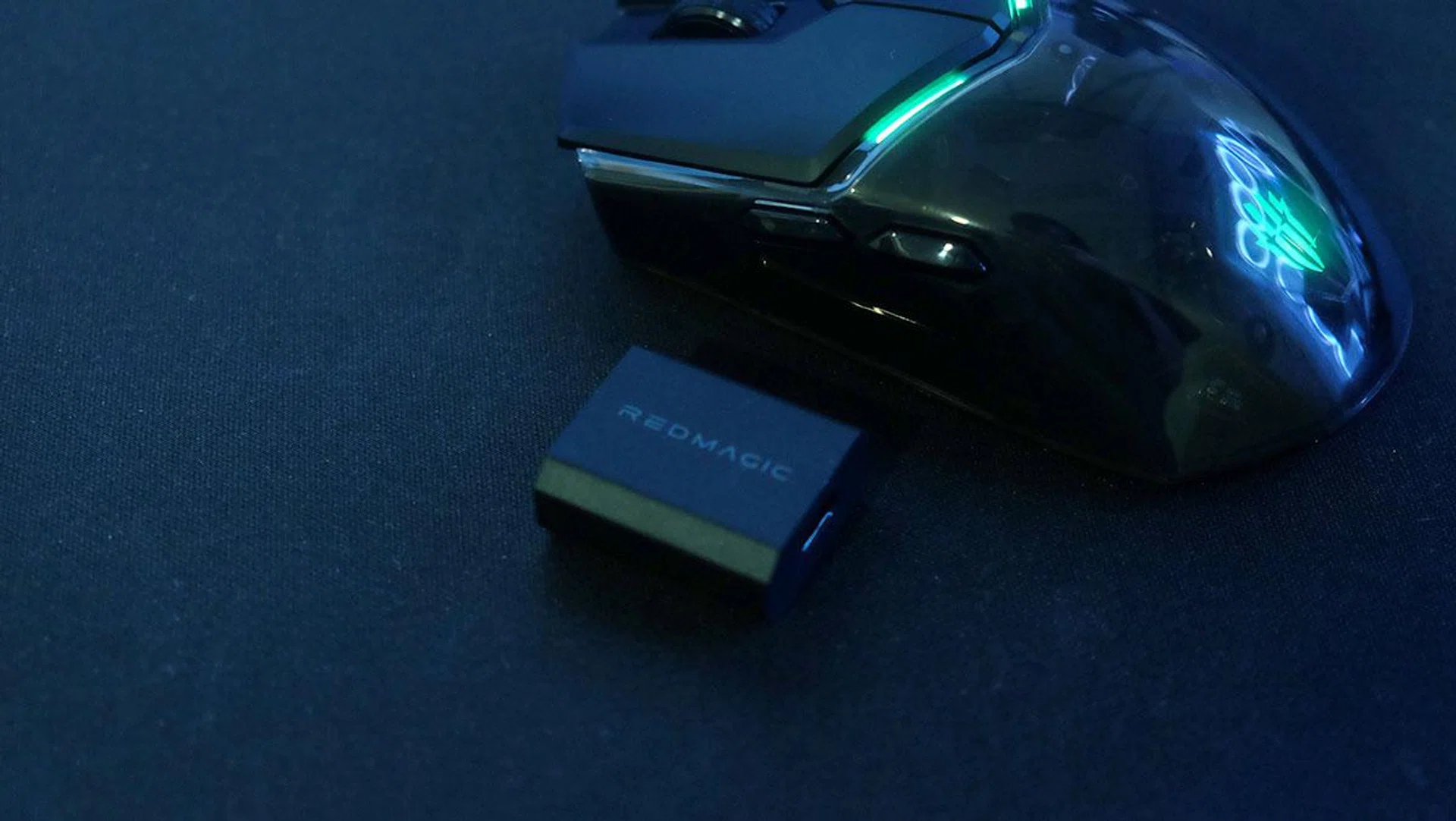 The included adapter helps you bring the dongle closer to the mouse.