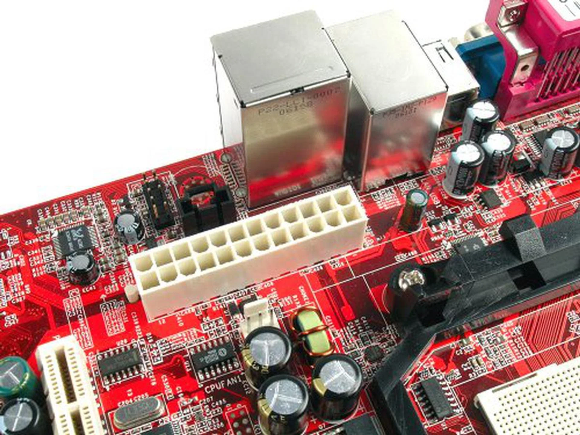 ATX power connector at the back end of the board, but because of the orientation of the CPU socket and DIMM slots, it is actually easy to work around.