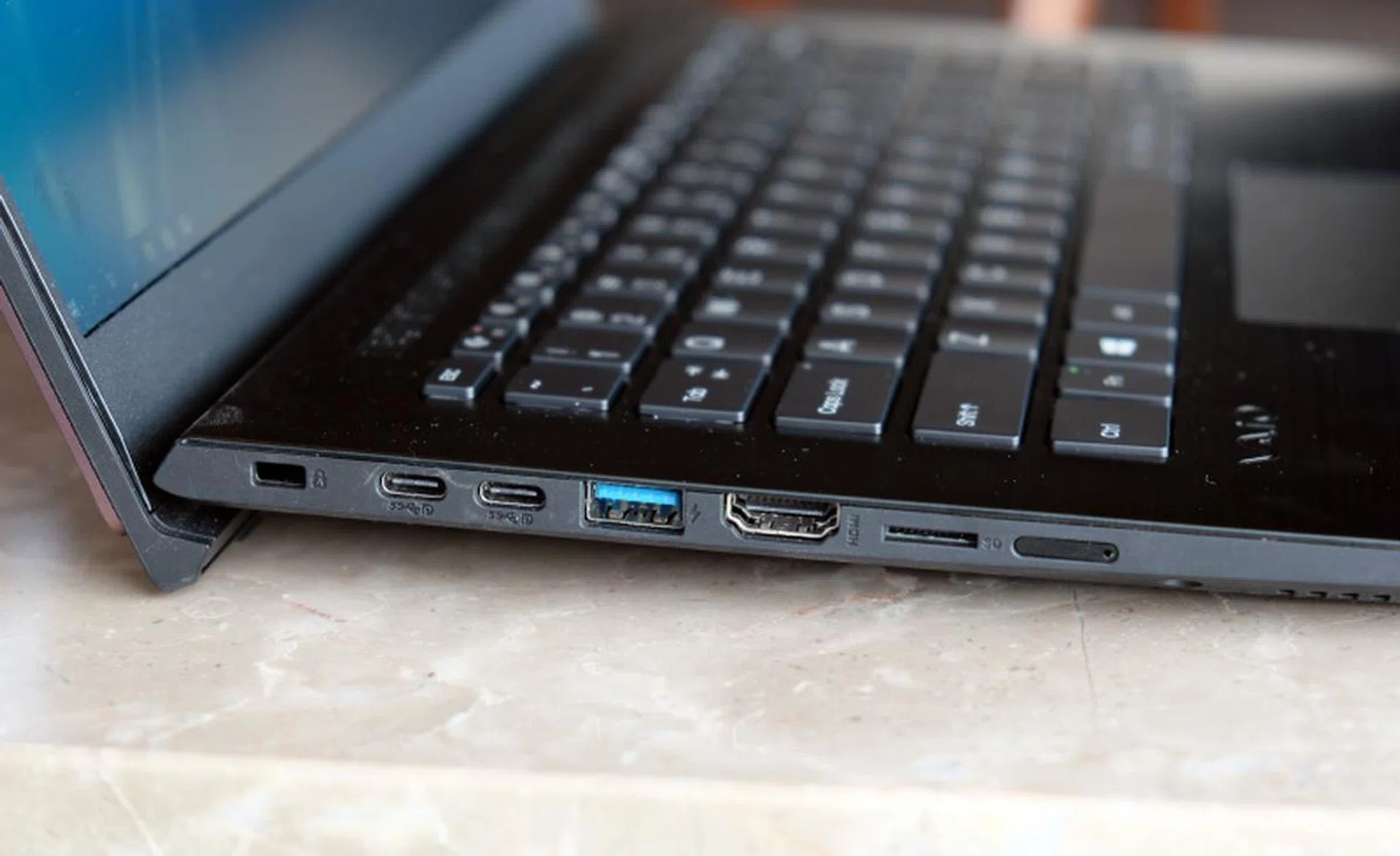 On the left of the notebook lies the bulk of the ports. There are two USB-C ports (USB 3.1 Gen 1), a single USB-A (USB 3.0) port, a full-size HDMI port, and a microSD card reader.