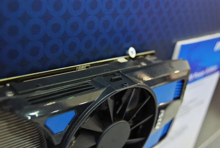 The latch shown here, has to be depressed in order to slide the fan housing back,