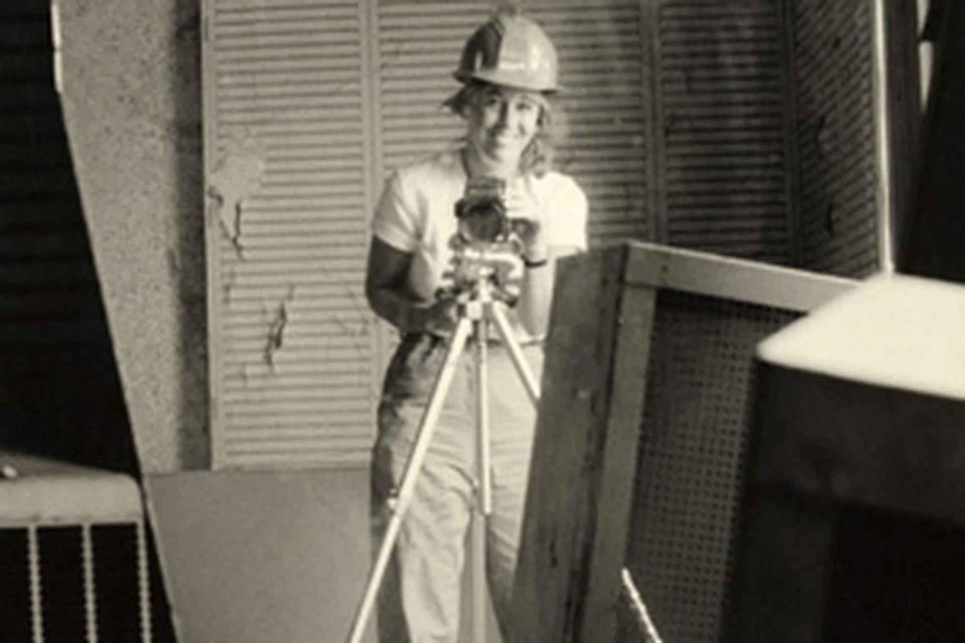 Carol Highsmith self-portrait in a broken mirror that she photographed during the Willard Hotel restoration, Washington, DC (c. 1980–90) (image via Wikimedia Commons)