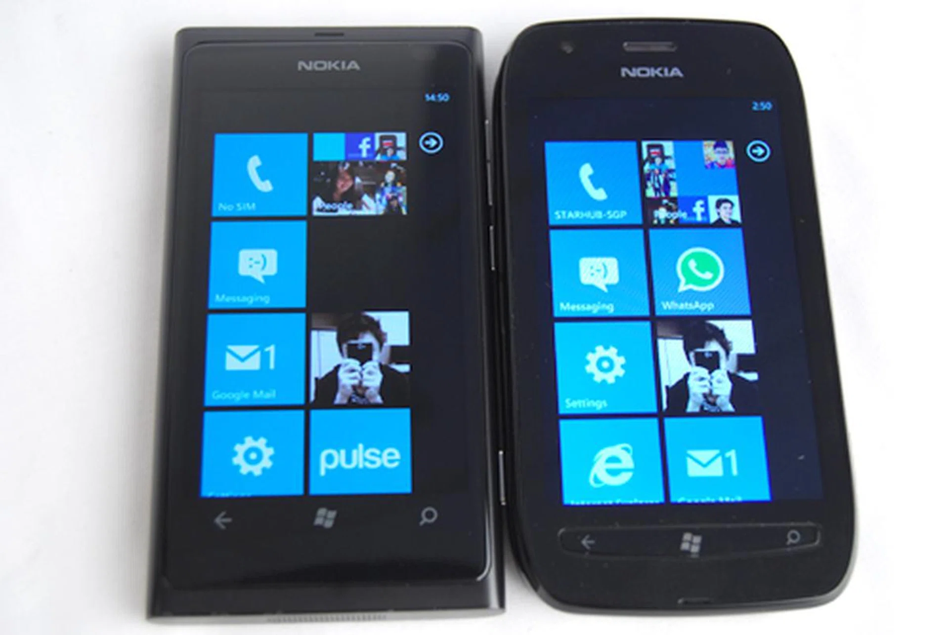 In comparison, the Lumia 800 (left) and its angular edges don't feel as comfortable as the curved design taken by the Lumia 710 (right).