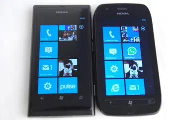 In comparison, the Lumia 800 (left) and its angular edges don't feel as comfortable as the curved design taken by the Lumia 710 (right).