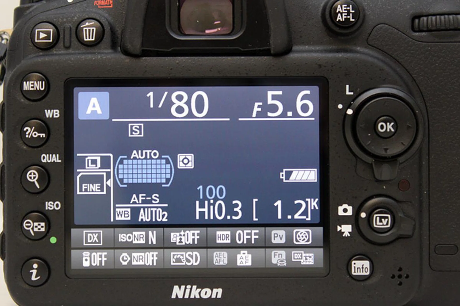 The Information Display is brought up with the Info button, but you'll have to press the 'i' button on the left to make changes! Not all of the commands are available though; you can't switch ISO for example even though it's on the screen.