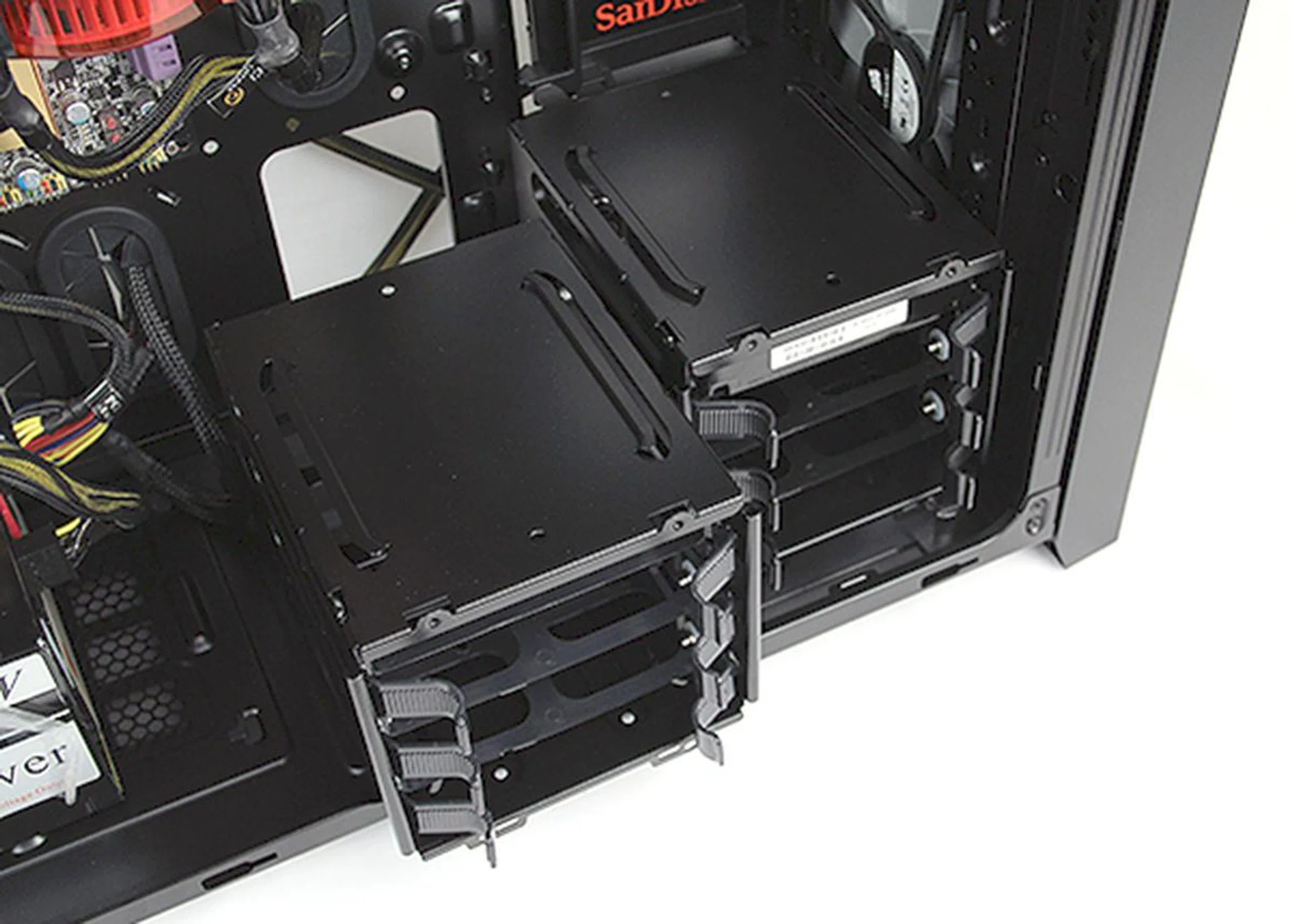 To install fans or radiators at the bottom will require users to remove the HDD cage. Fortunately they are easy to remove, simply undo two screws and slide them out.