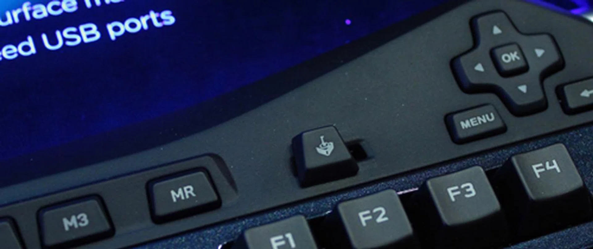 A switch on both keybaords can be used to engage "Gaming Mode" which disables the Windows key and pop-ups.