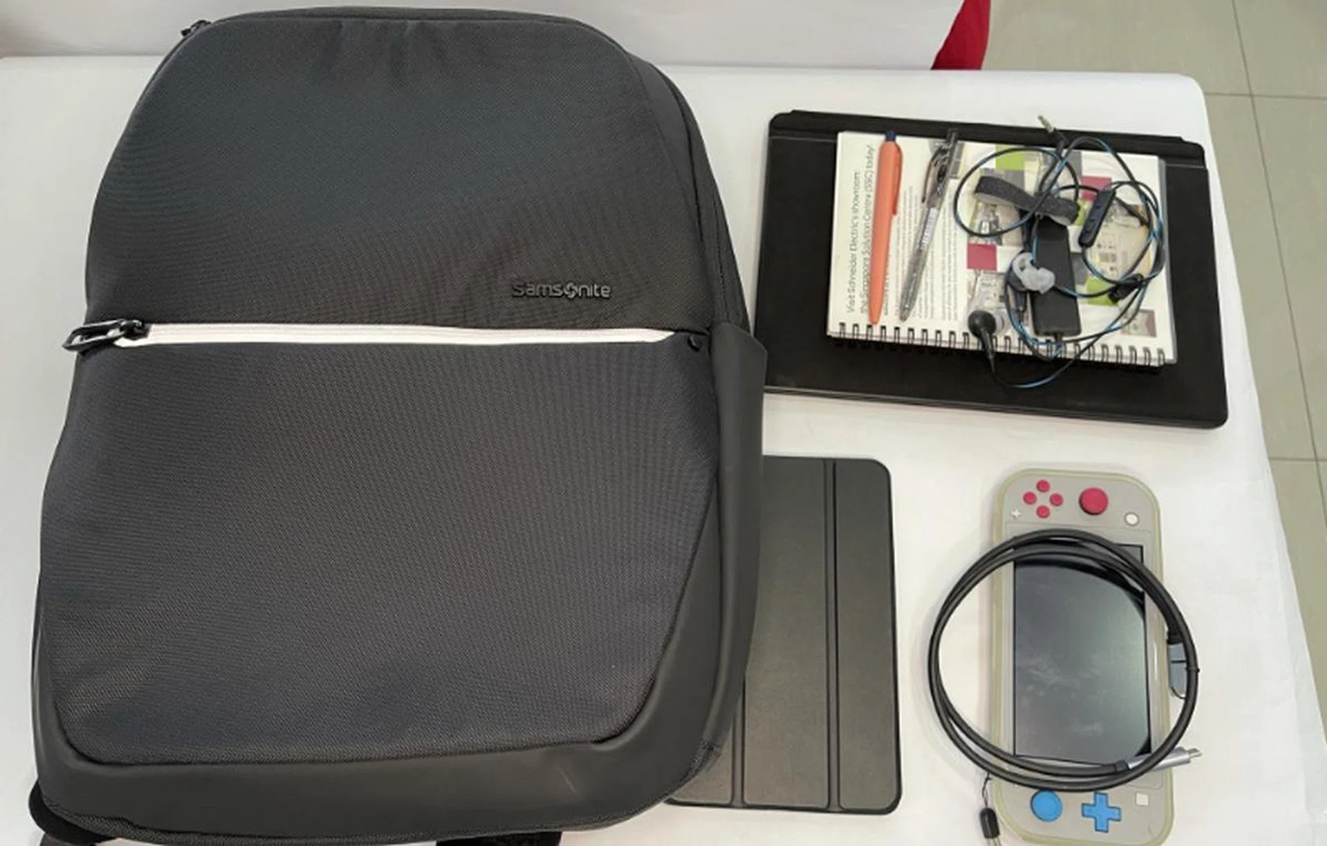 My laptop, iPad, power bank, earphones, Switch, and notebook were my everyday carry. 