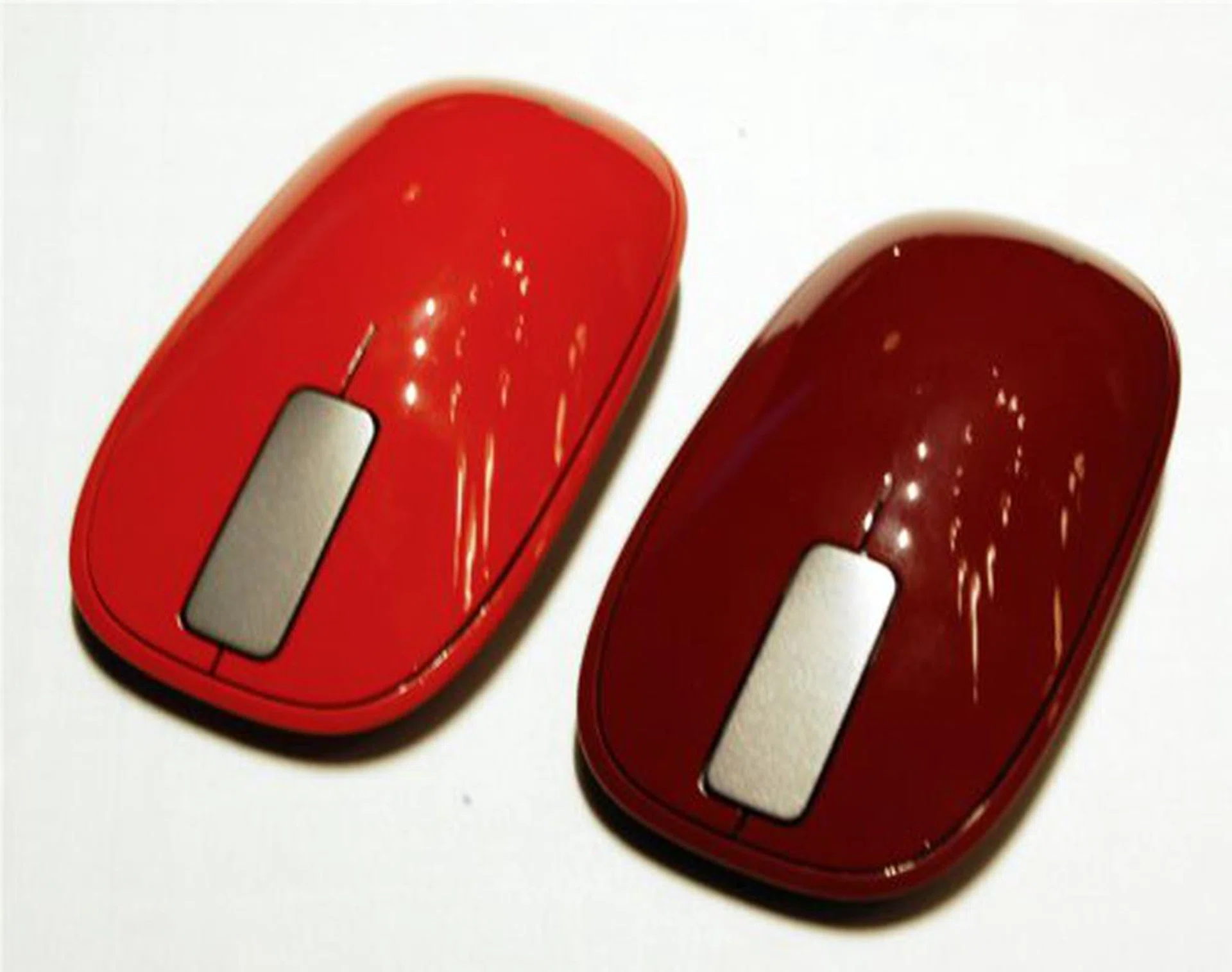 The new Explorer Touch Mouse retains its minimalist sensibilities, but now offers funkier color options such as Rust Red and Sangria Red.
