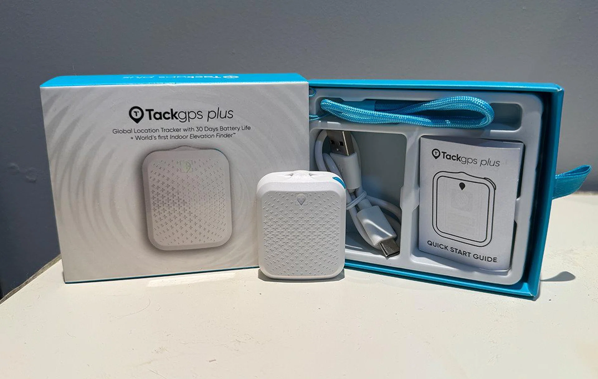 In the box, you get the TackGPS Plus tracker, a Type-C charging cable, a lanyard and a quick start guide..