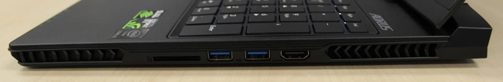 The right side has two USB 3.0 ports, a HDMI output port and the SD card reader.