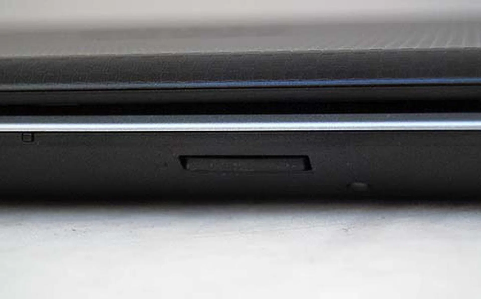 On the front, just below the trackpad area is the 4-in-1 card reader.