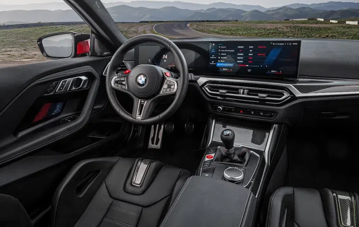 The two displays curve around the driver. (Image source: BMW)