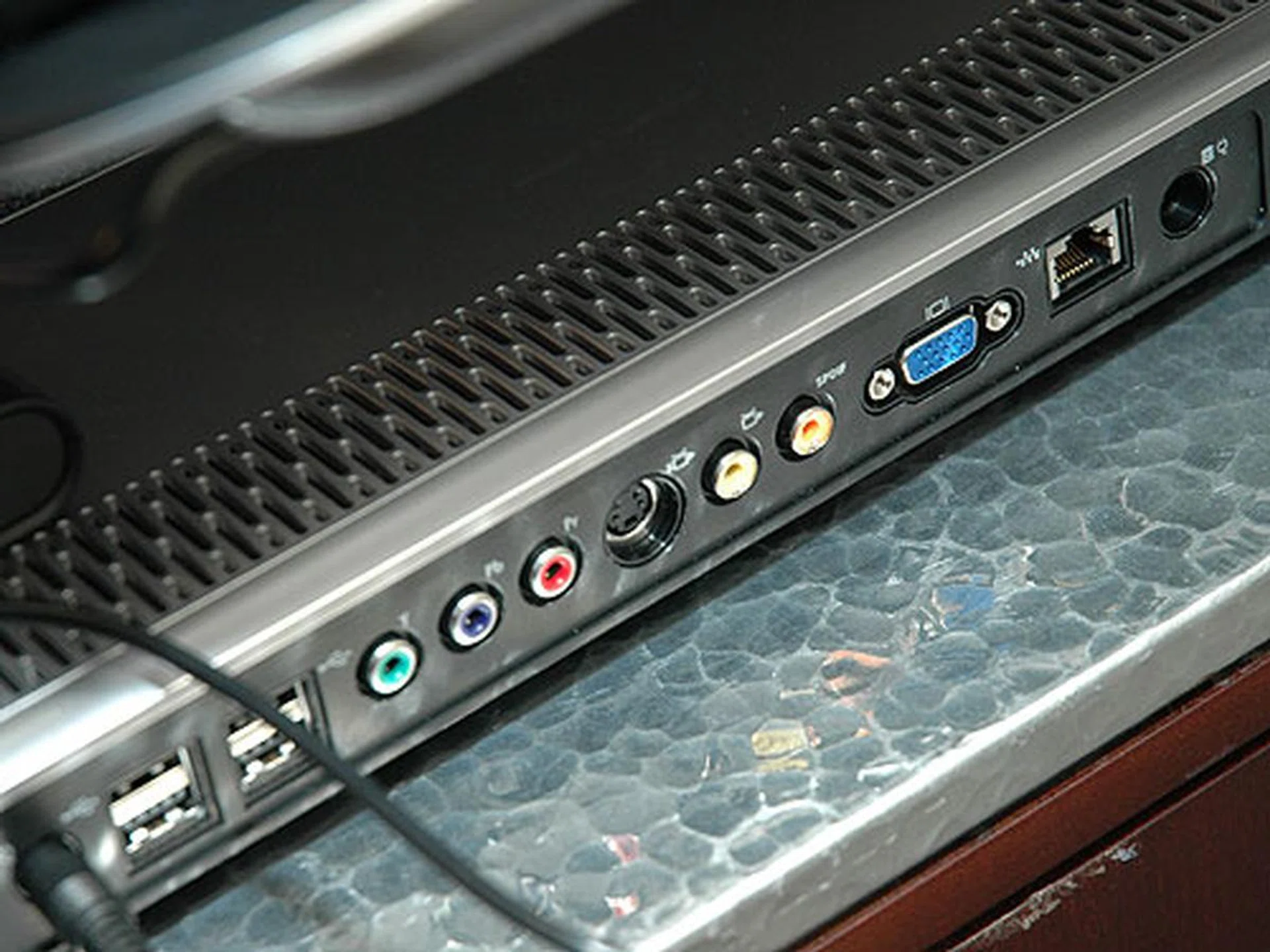 The expansion base gives you more connectivity options such as more USB ports, component video jacks, S-Video jack, composite video jack, S/PDIF jack, external analog monitor port and RJ-45 Ethernet port.