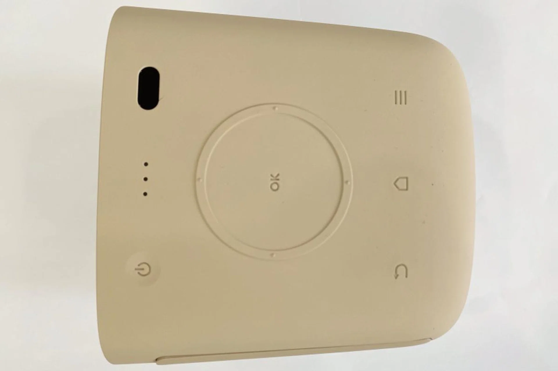 No, the white balance isn't off and neither is the projector housing old - it is literally a strong beige colour as seen here. Note the control options present on the top face of the projector for direct and immediate control.