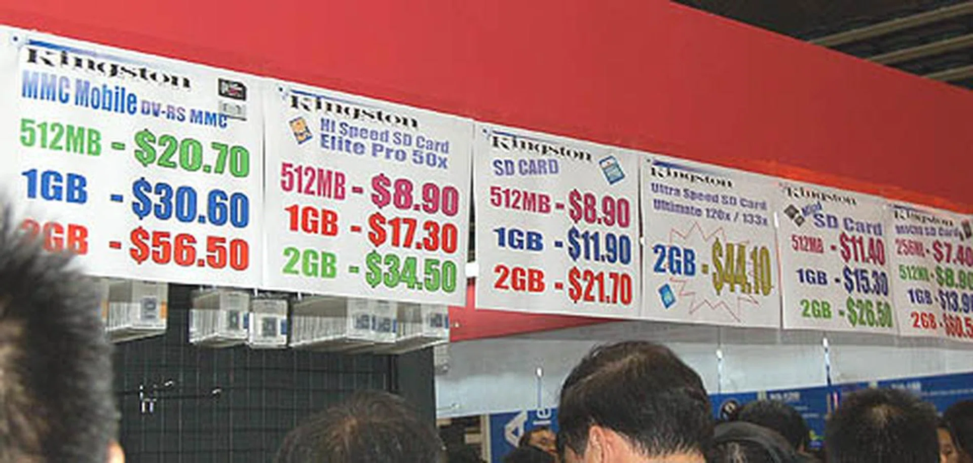  Are these the best flash memory prices at the IT show? The long queue of shoppers seems to think so.  