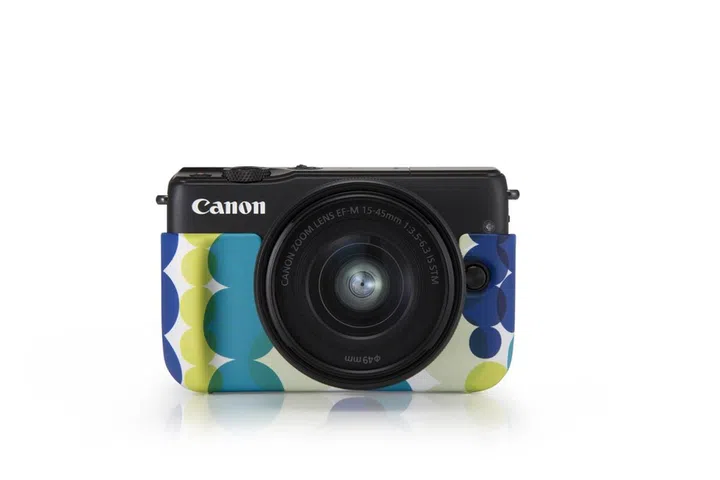 Canon EOS M10, in a jacket Canon terms as aqua.