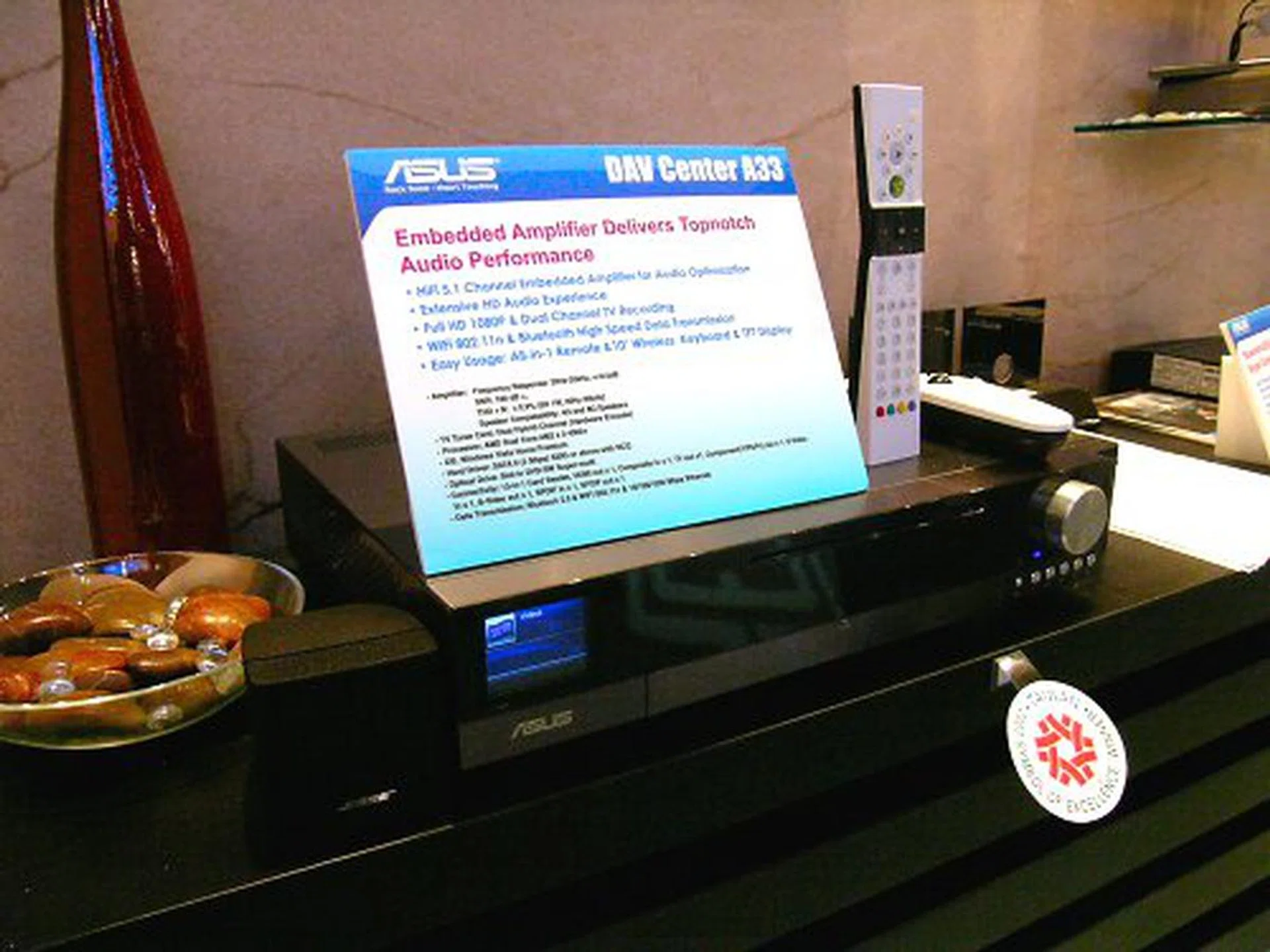  ASUS updates their home entertainment center this year with the DAV Center A33. One of the biggest difference is that last year's A22 was based on an Intel Viiv platform and the A33 now seems to be on AMD Live!. Nevertheless, the A33 offers and embedded 5.1 channel audio amplifier, full 1080p support, dual channel recording and 802.11n wireless network support. The DAV A33 is also leaps ahead of the older A22 in terms of looks as a living room entertainment center.  