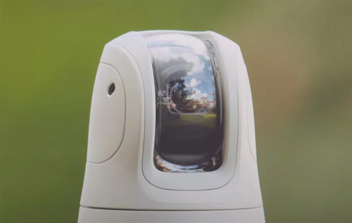 A small camera that tracks faces and smiles and automatically shoots. (Screenshot: CanonAsia's YouTube channel)
