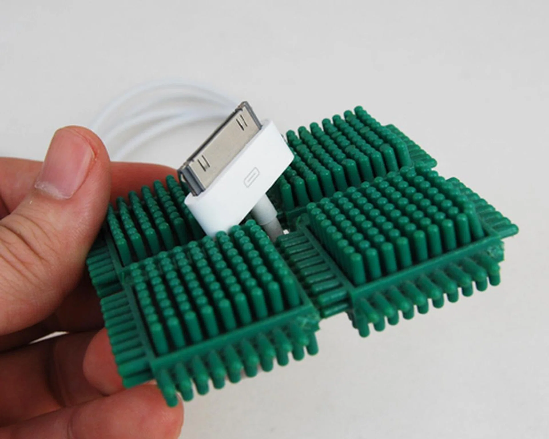 A small hole in between the four building blocks is adequately sized to hold the connector in place.