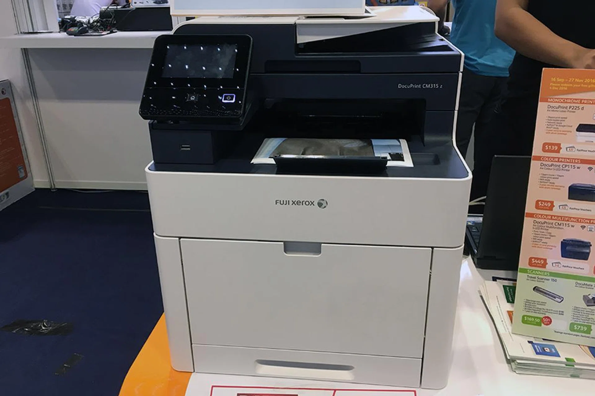 The DocuPrint CM315 z is a new A4 color multi-function laser printer from Fuji Xerox. Designed for SOHOs and small workgroups, it has a print speed of 28ppm (both color and mono), and has a duplex ADF. Going for $899, and if you top up an extra $199, you get a 3-year next business day on-site warranty.